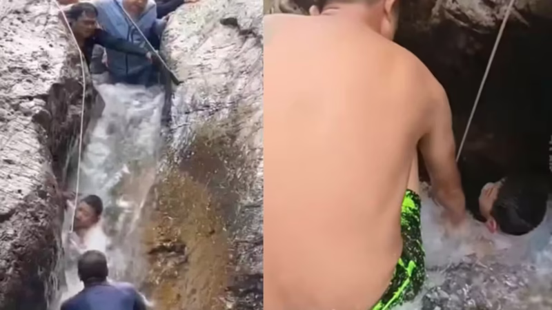 Turistas fazem parede humana para represar rio e salvar menino